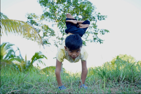 Boy Walks On Hands Oriental