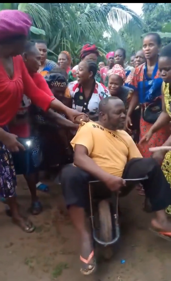 Women wheelbarrow parade
